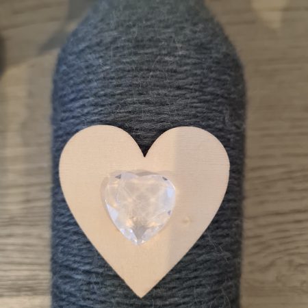 Dark grey yarn wrapped bottles