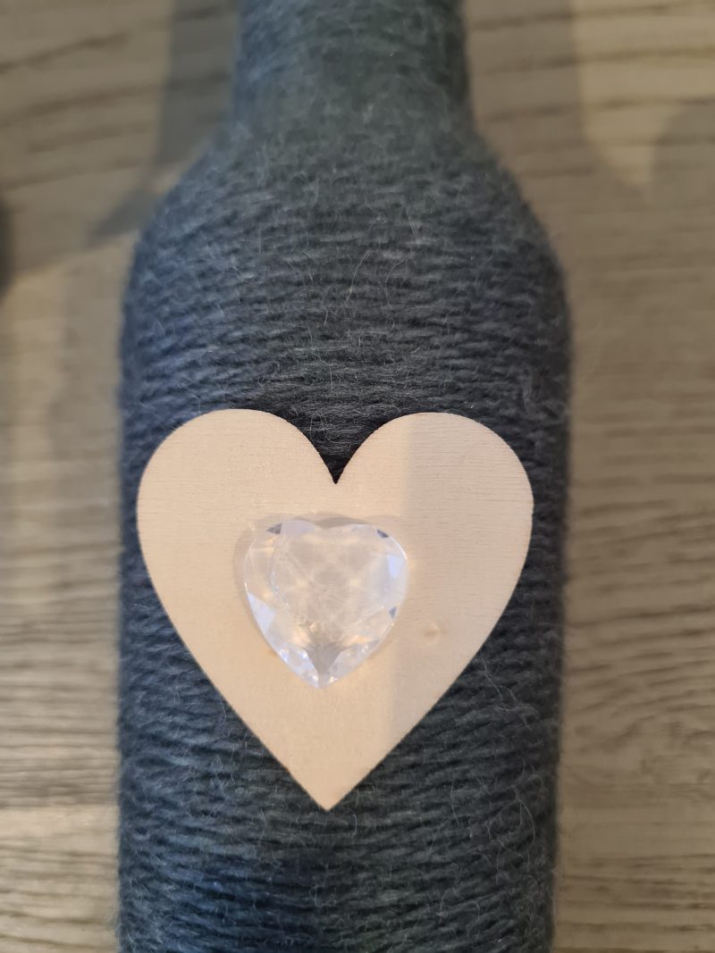 Dark grey yarn wrapped bottles