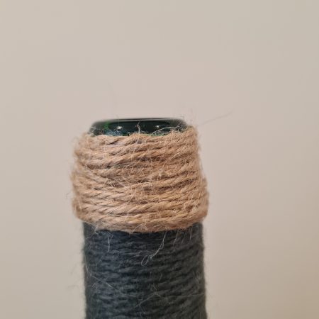 Dark grey yarn wrapped bottles