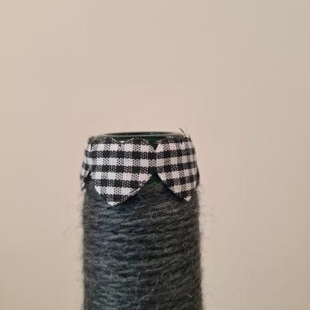 Dark grey yarn wrapped bottles