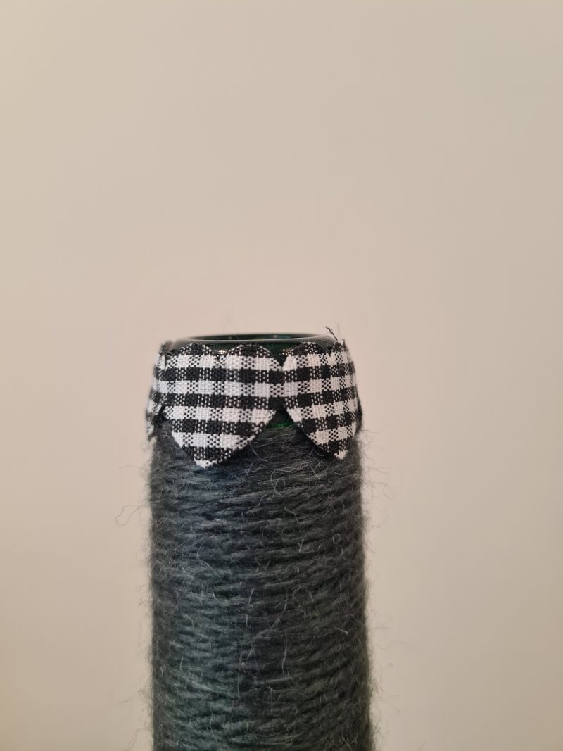Dark grey yarn wrapped bottles