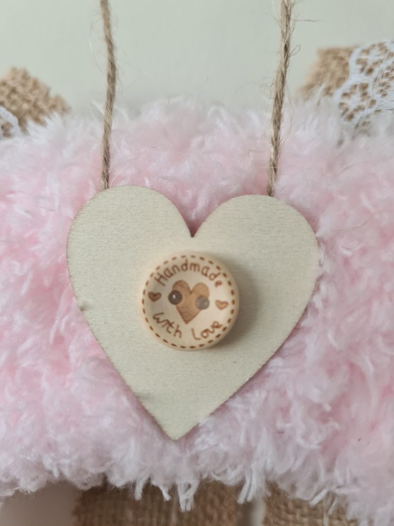 Delicate pink yarn wrapped wreath