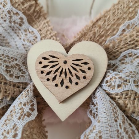 Delicate pink yarn wrapped wreath