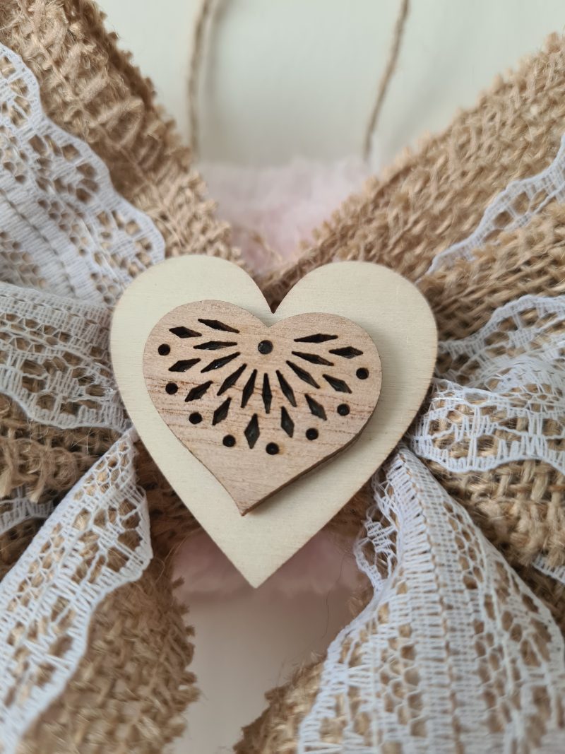 Delicate pink yarn wrapped wreath