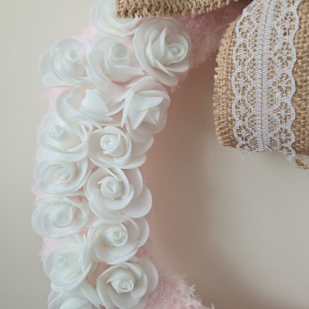 Delicate pink yarn wrapped wreath