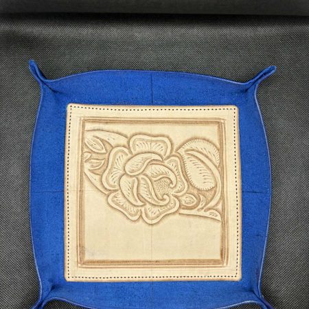 Handmade leather trays, available in black, blue and burgundy.