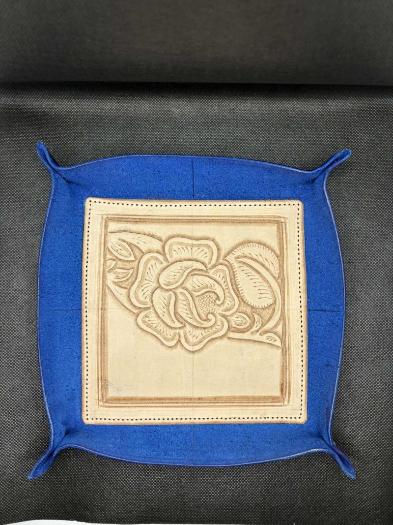 Handmade leather trays, available in black, blue and burgundy.