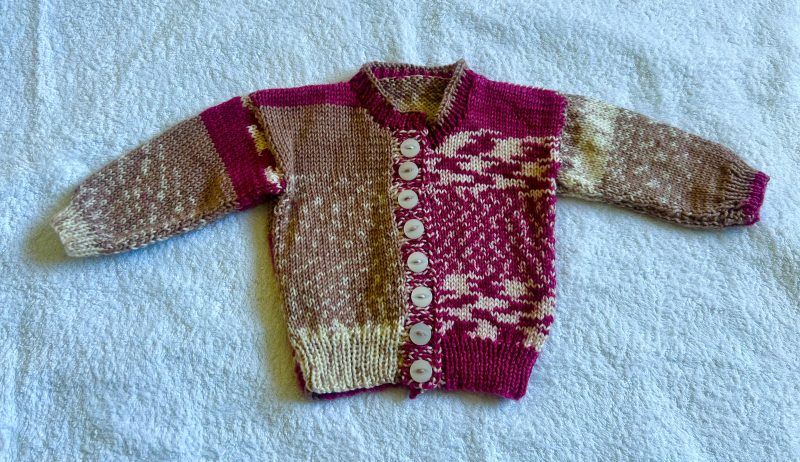 Hand knitted baby cardigan