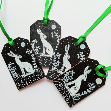 hand painted special set of 4 gift tags white hares on black background in moonlight green ribbons