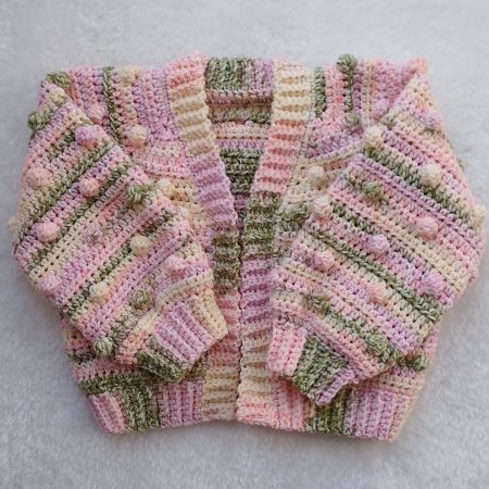 Crochet Cardigan in Spring Colours for Girls. Available in sizes New Baby through to Child 3-4 years