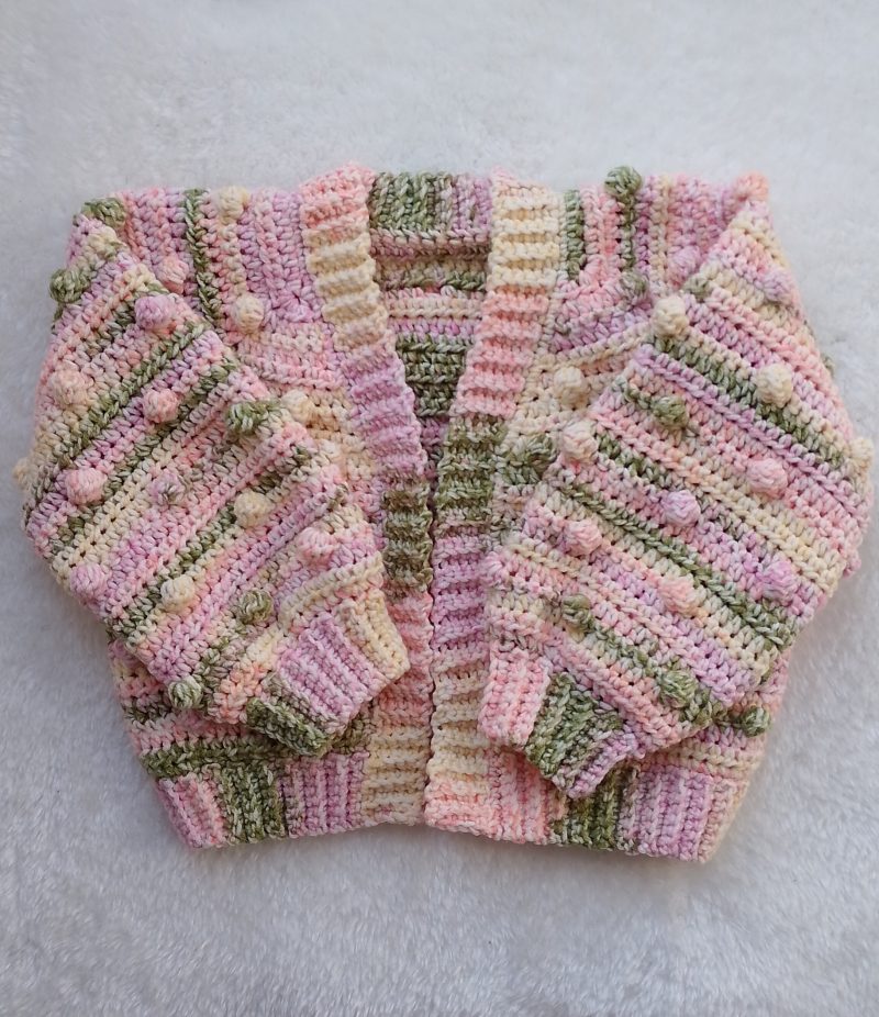 Crochet Cardigan in Spring Colours for Girls. Available in sizes New Baby through to Child 3-4 years