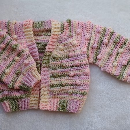 Crochet Cardigan in Spring Colours for Girls. Available in sizes New Baby through to Child 3-4 years