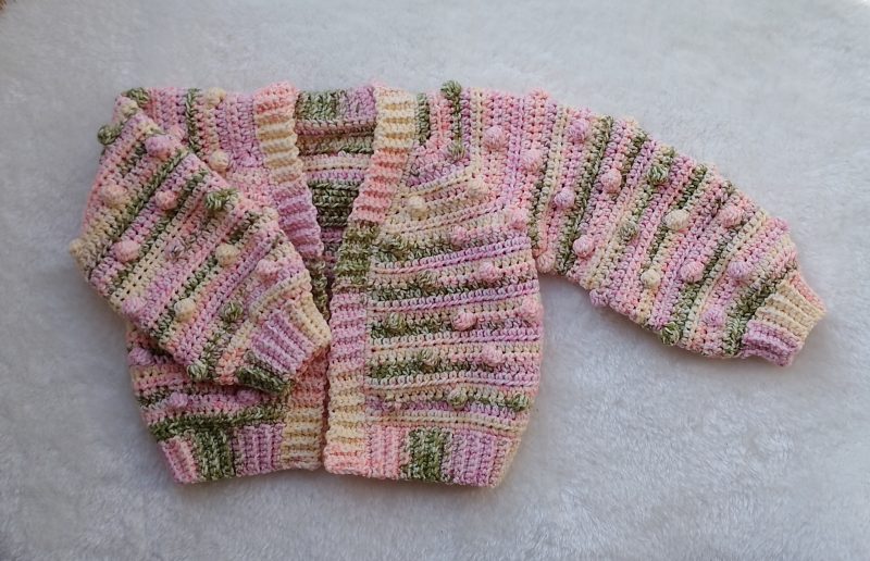 Crochet Cardigan in Spring Colours for Girls. Available in sizes New Baby through to Child 3-4 years