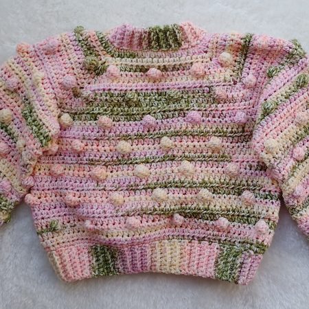 Crochet Cardigan in Spring Colours for Girls. Available in sizes New Baby through to Child 3-4 years