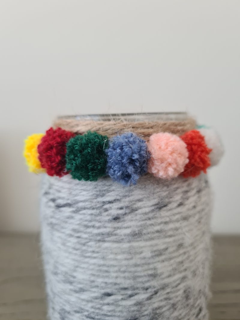 Yarn wrapped pom pom vase