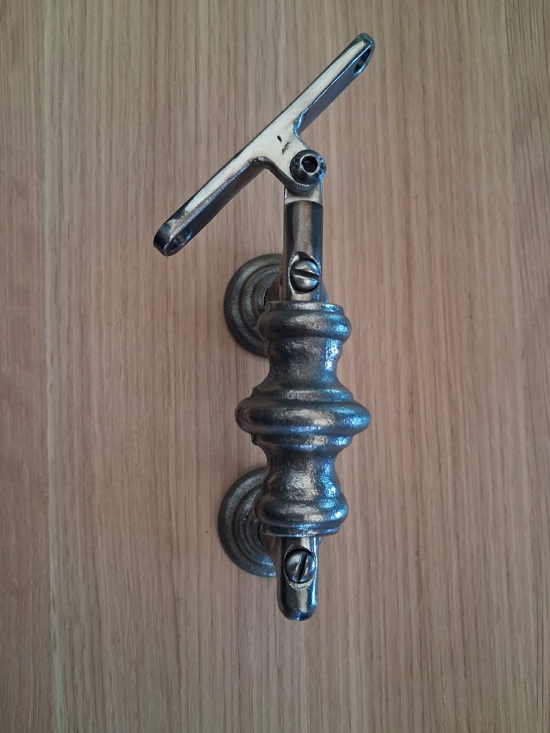 Traditional style wrought iron handrail bracket , burnished steel , clear lacquer finish