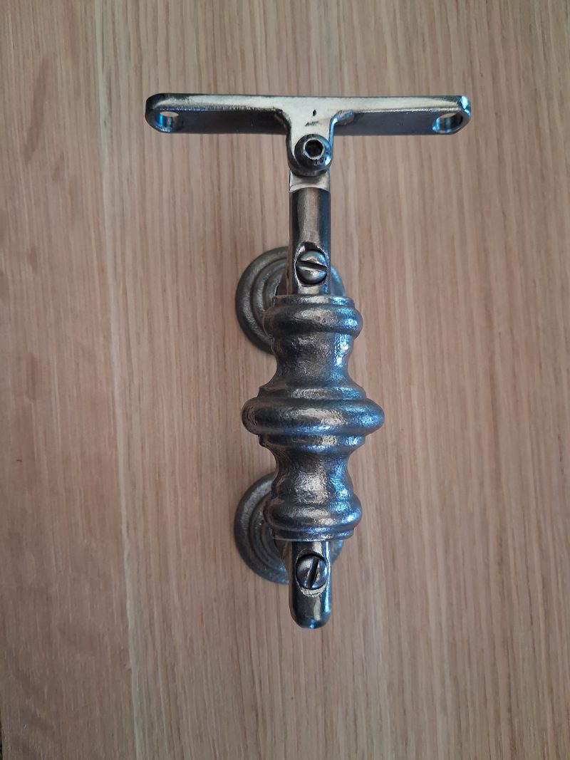 Traditional style wrought iron handrail bracket , burnished steel , clear lacquer finish