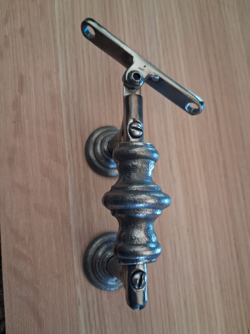 Traditional style wrought iron handrail bracket , burnished steel , clear lacquer finish