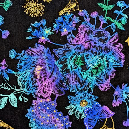 Front detail of black cushion cover featuring colourful rainbow floral pattern with butterflies and gold accents, lined with a zip closure