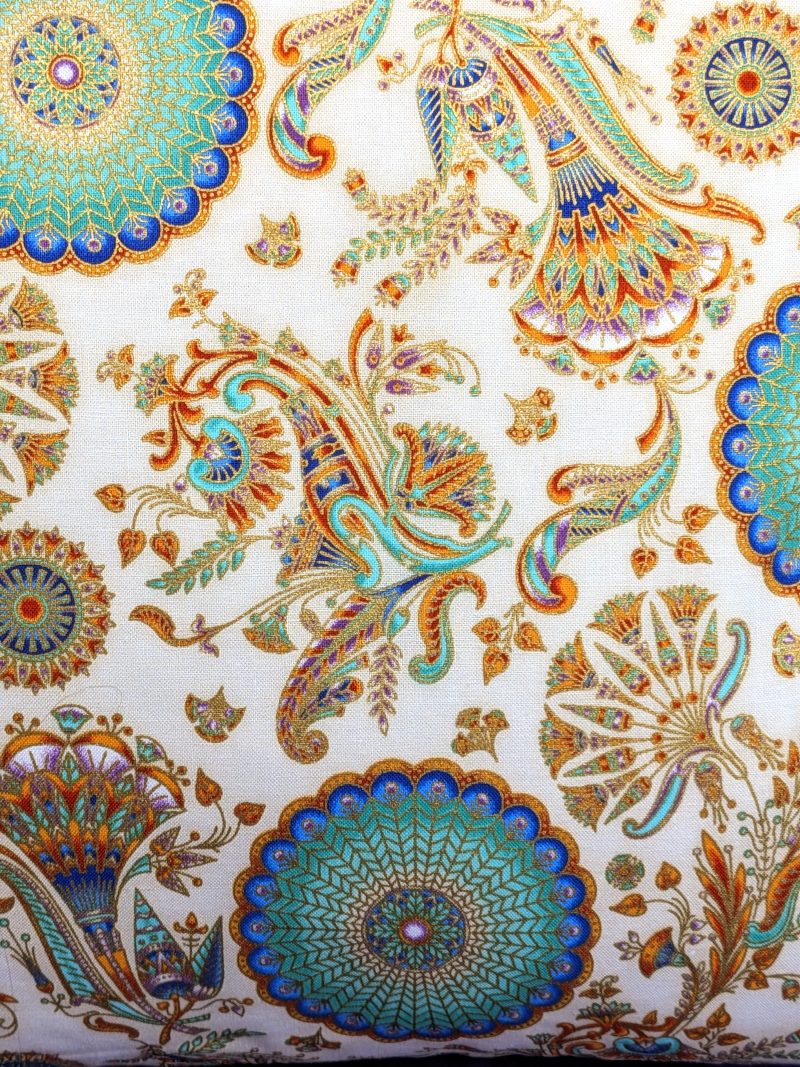 Front detail of boho cushion cover with turquoise and gold mandala floral pattern on a cream background, 18 inch decorative pillow cover