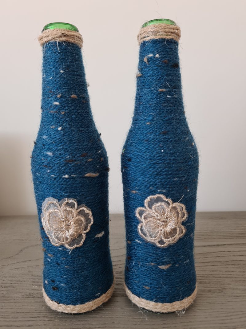 Set of 2 upcycled glass bottles Wrapped with teal yarn & jute trim
