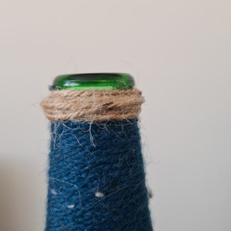 Set of 2 upcycled glass bottles Wrapped with teal yarn & jute trim