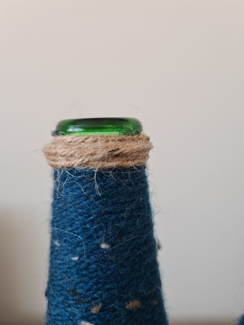 Set of 2 upcycled glass bottles Wrapped with teal yarn & jute trim