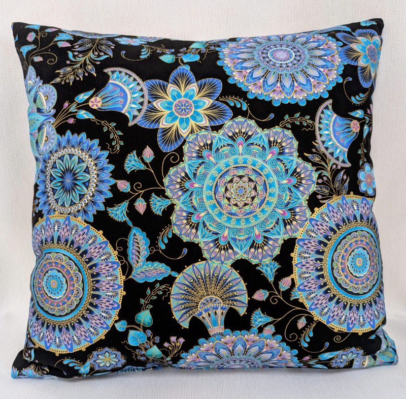 Reverse of blue mandala floral cushion cover with intricate circular patterns on a black background, 45cm square decorative pillow case