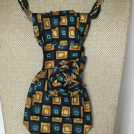 Handmade, elegant necktie accessory adorned with a beautiful flowery element