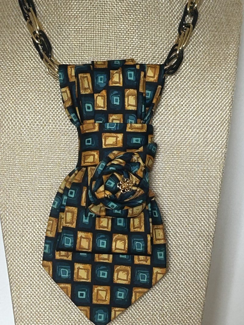 Handmade, elegant necktie accessory adorned with a beautiful flowery element