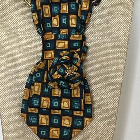 Handmade, elegant necktie accessory adorned with a beautiful flowery element