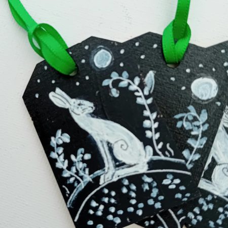 hand painted special set of 4 gift tags white hares on black background in moonlight green ribbons
