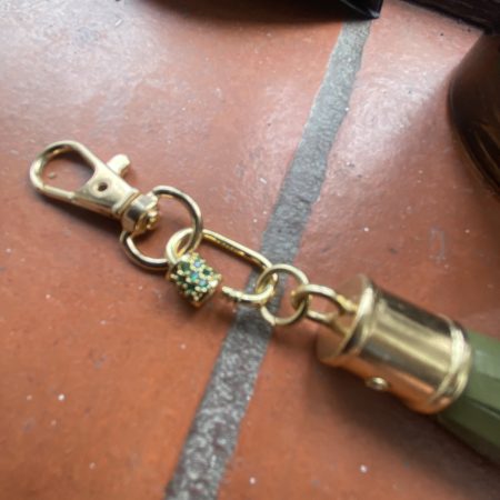Absolutely stunning bag charm or keyring brass and cubic zaconia imbelishment
