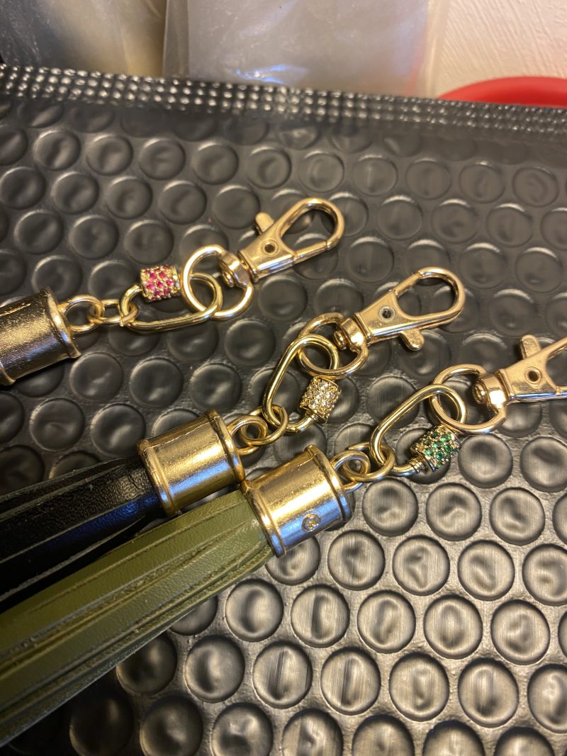 Absolutely stunning bag charm or keyring brass and cubic zaconia imbelishment