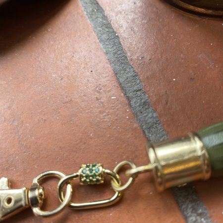 Absolutely stunning bag charm or keyring brass and cubic zaconia imbelishment