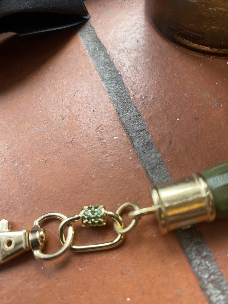 Absolutely stunning bag charm or keyring brass and cubic zaconia imbelishment