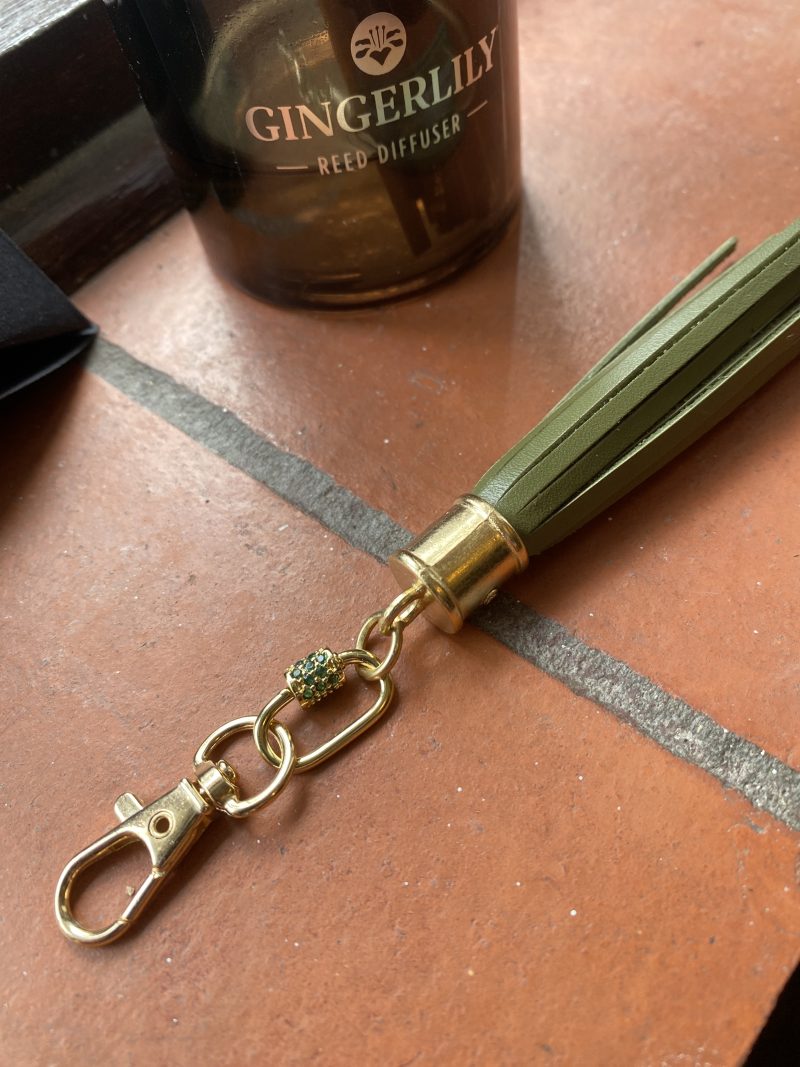 Absolutely stunning bag charm or keyring brass and cubic zaconia imbelishment