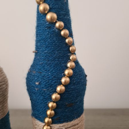 Set of 2 upcycled glass bottles Wrapped with jute and teal yarn