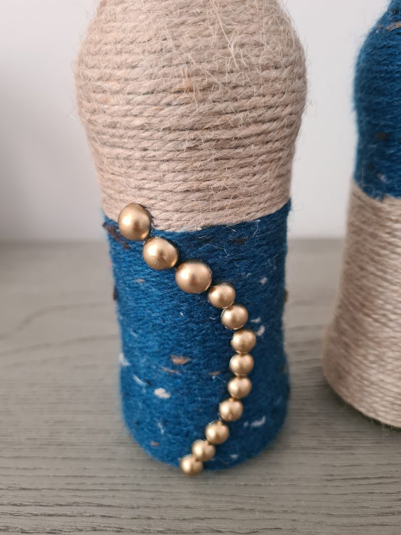 Set of 2 upcycled glass bottles Wrapped with jute and teal yarn