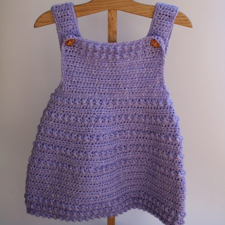Crochet Pinafore Style Dress in Lilac for a Baby Girl through to Toddler Girl