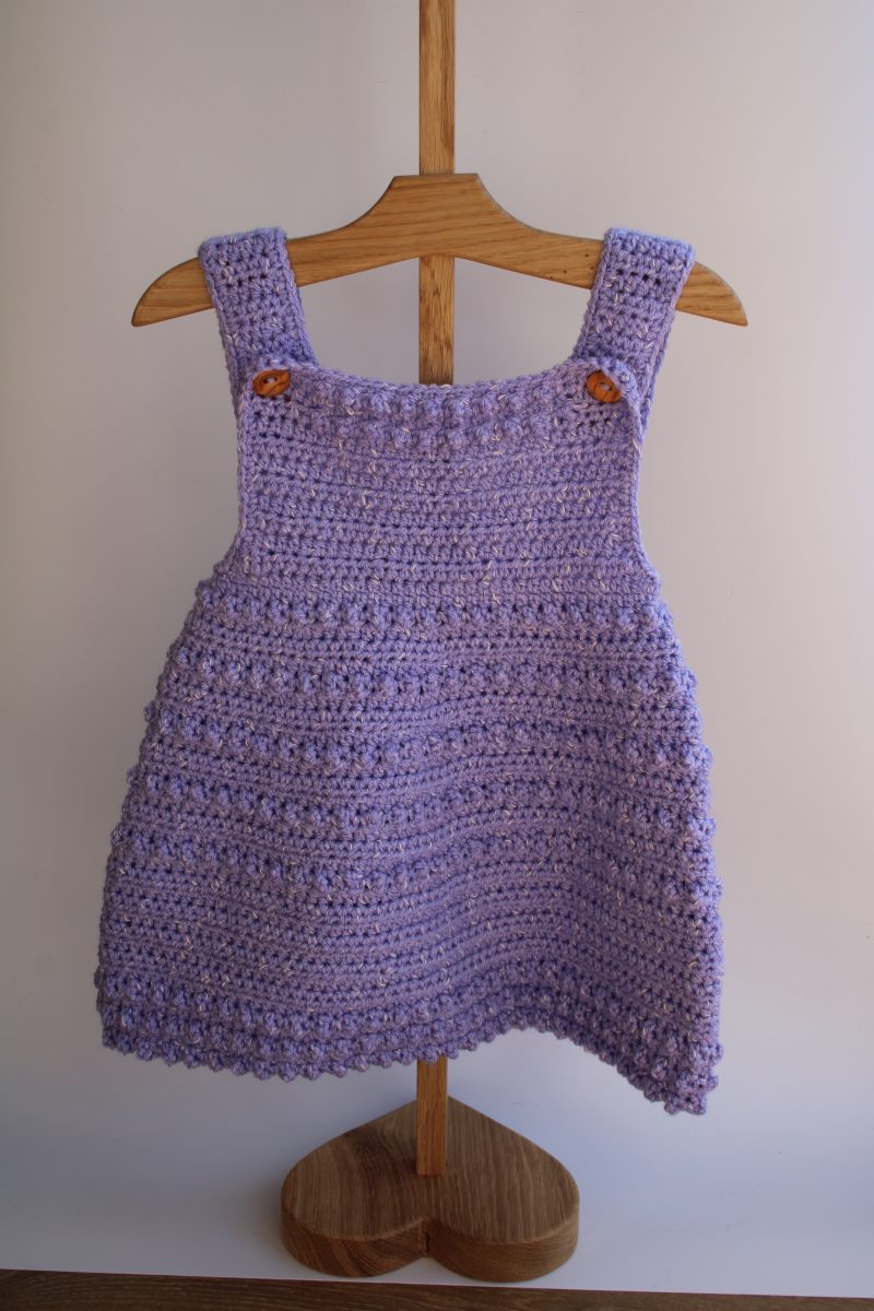 Crochet Pinafore Style Dress in Lilac for a Baby Girl through to Toddler Girl
