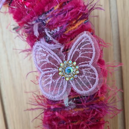 Vibrant pink yarn wrapped wreath