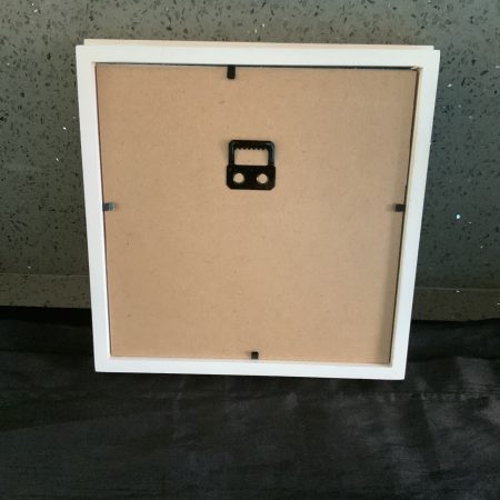 Small red paper flower heart