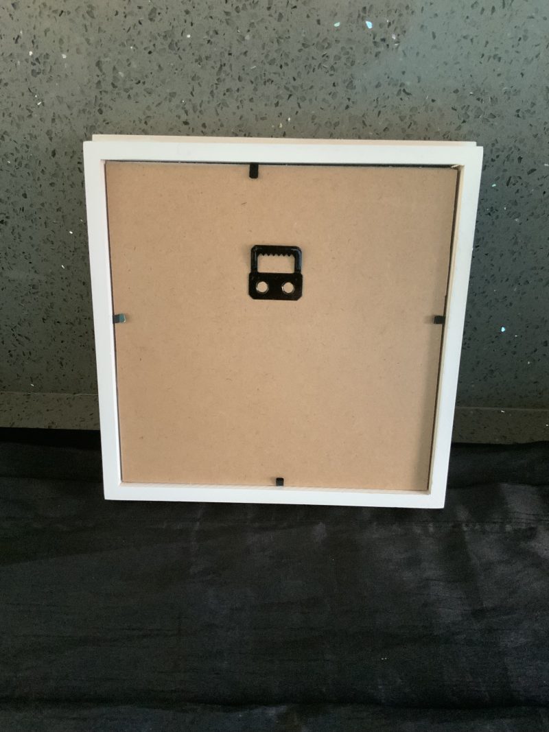 Small red paper flower heart