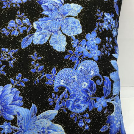 Front detail of blue floral cushion cover with detailed flowers on a black background, 18 inch square, zipped and lined