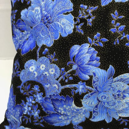 Front detail of blue floral cushion cover with detailed flowers on a black background, 18 inch square, zipped and lined