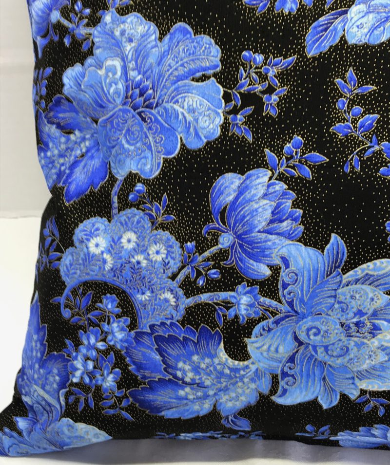 Front detail of blue floral cushion cover with detailed flowers on a black background, 18 inch square, zipped and lined