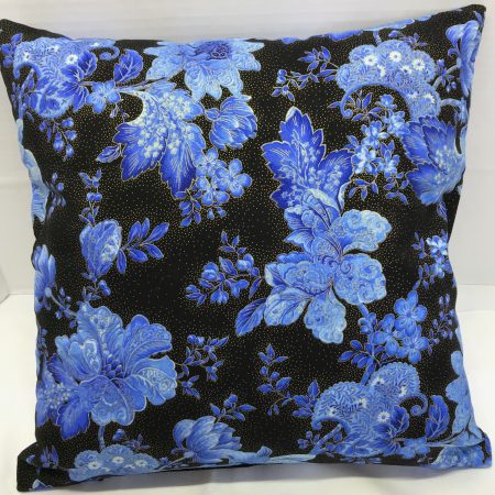 Reverse of blue floral cushion cover with detailed flowers on a black background, 18 inch square, zipped and lined