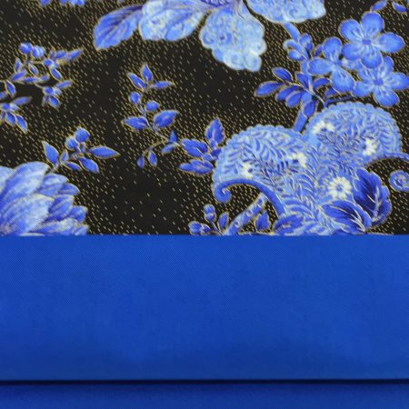 Lining detail of blue floral cushion cover with detailed flowers on a black background, 18 inch square, zipped and lined