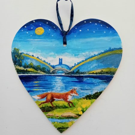 Lakeside Fox by moonlight on a wooden heart shape